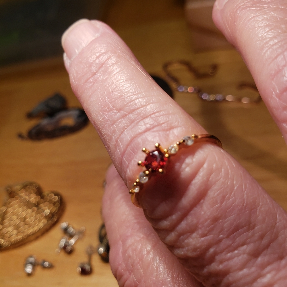 Red stone in gold setting